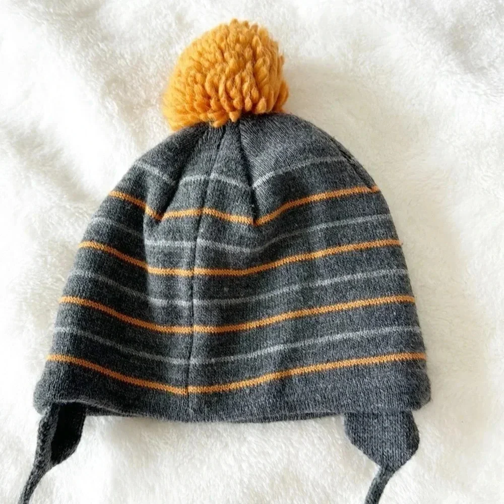 Zara baby winter Pom Pom hat with raccoon print size 6-12 months